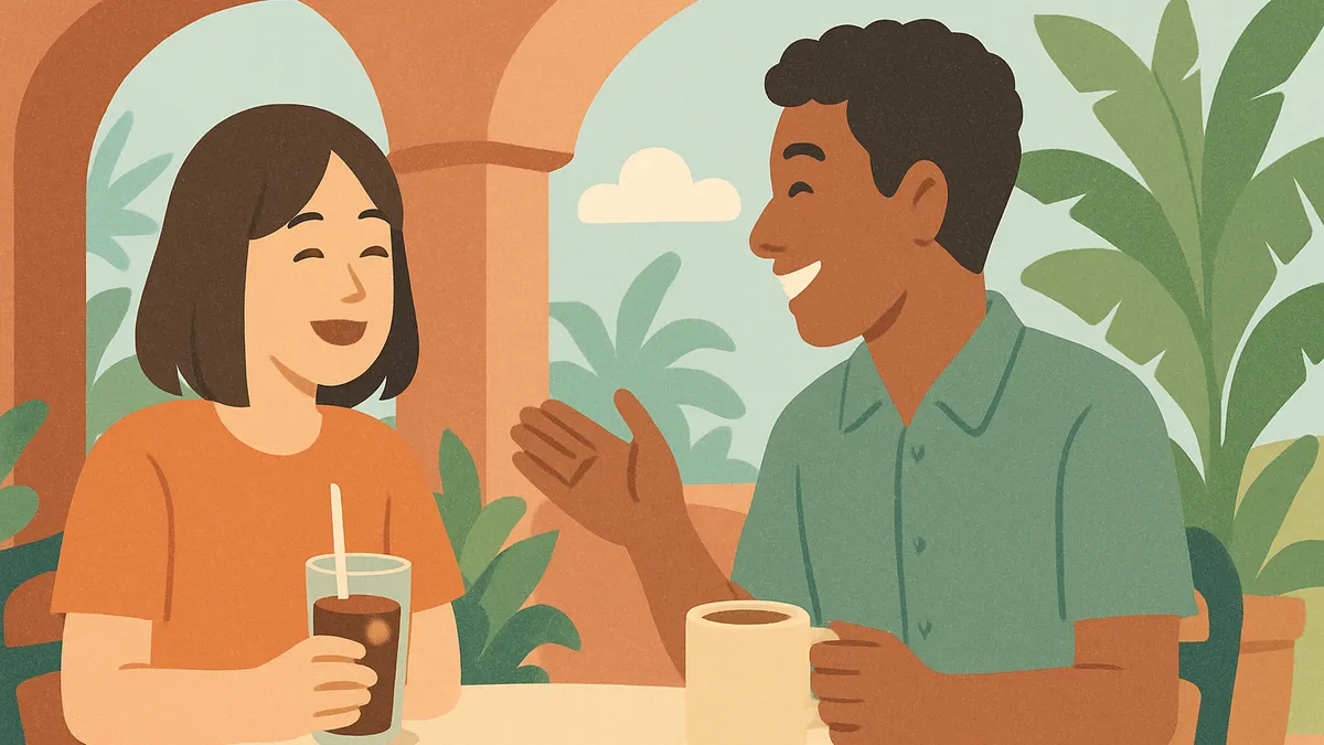 カフェで笑顔で会話を交わす二人の様子